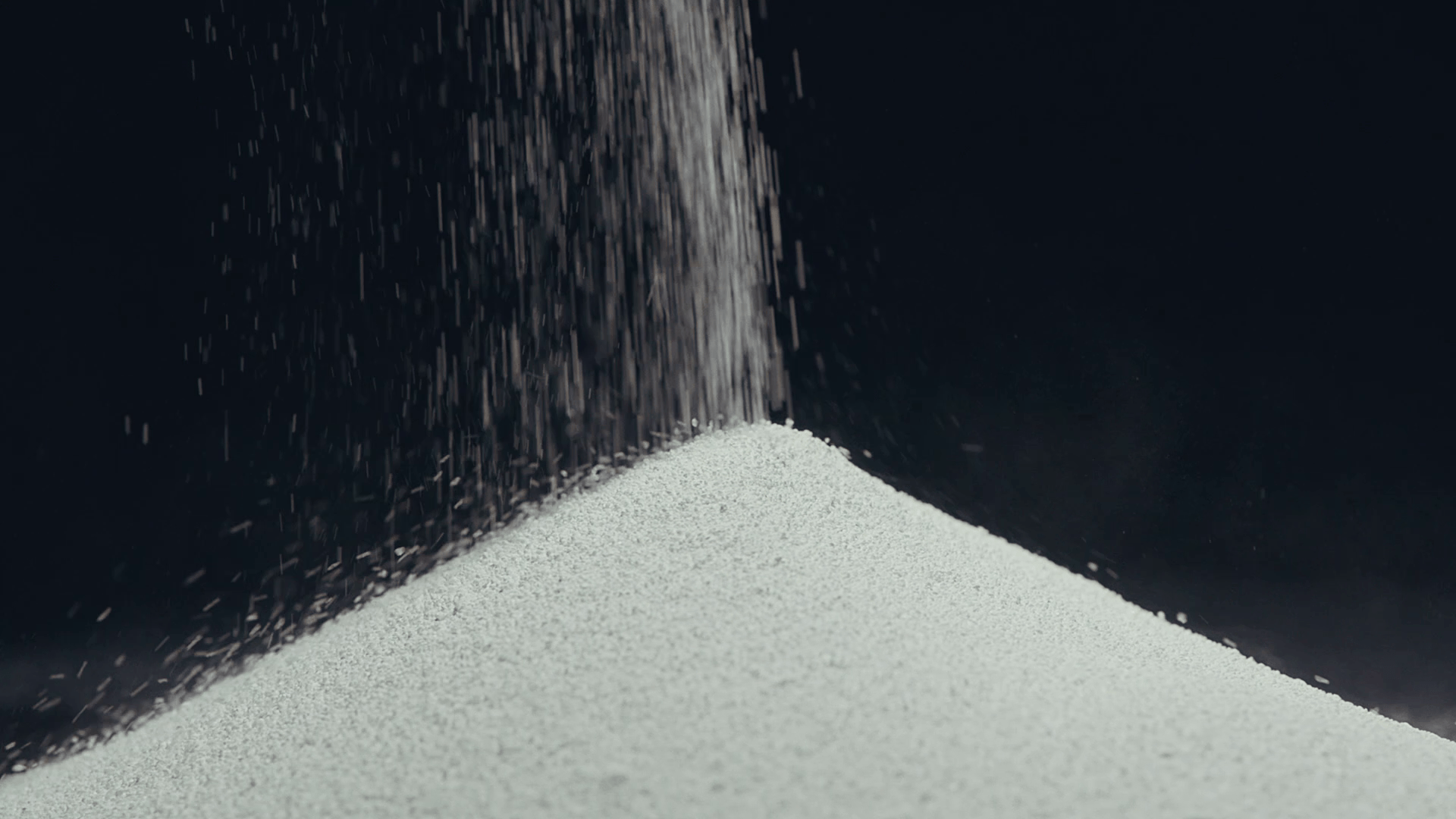 Soda ash grains sodium carbonate black background
