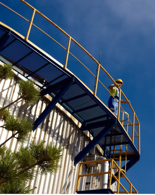 building railing employee industrial blue sky